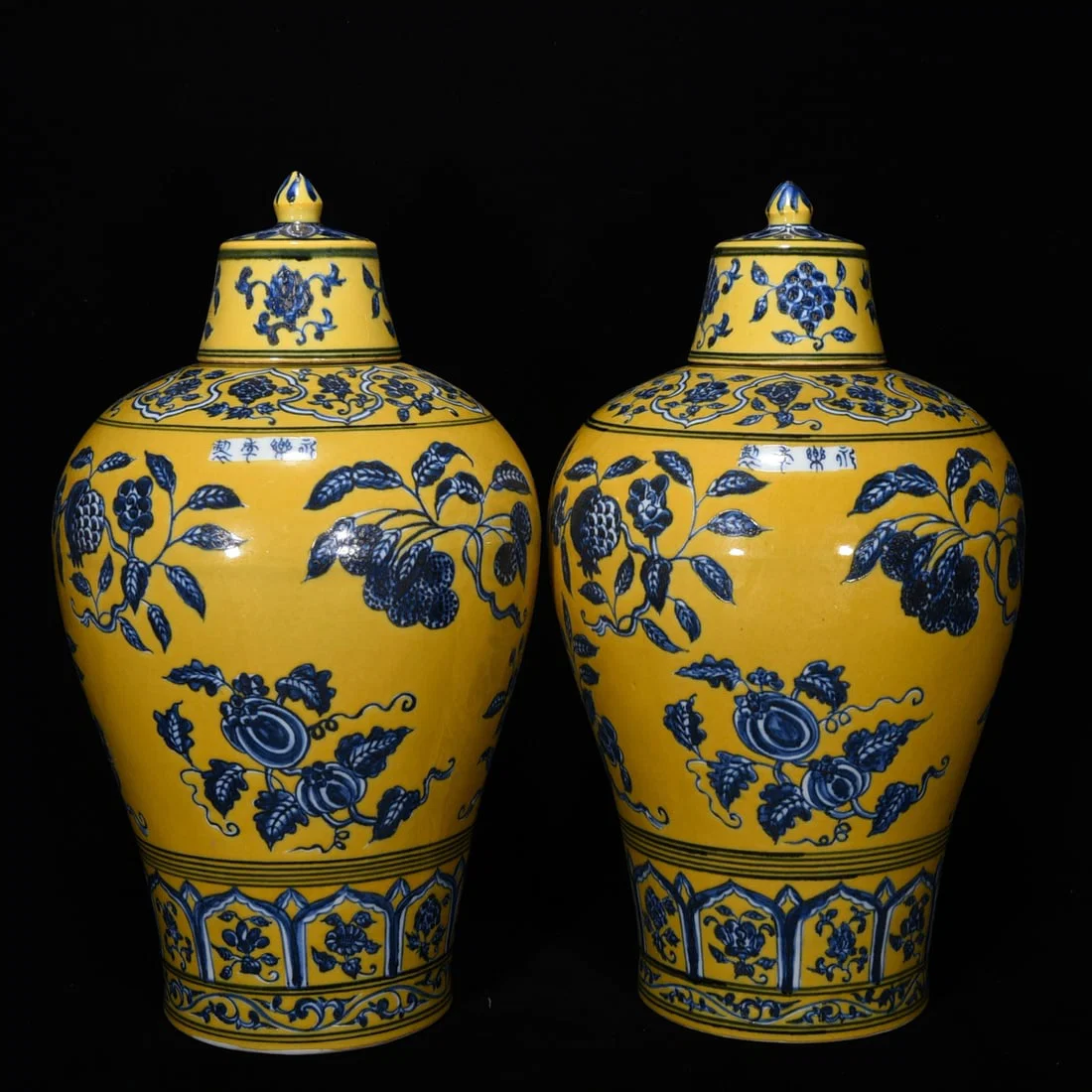 Ming Dynasty Xuande yellow ground blue and white auspicious flower fruit plum vase