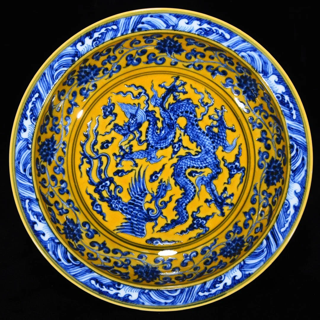 Ming Dynasty Xuande yellow ground blue and white dragon and phoenix fruit plate