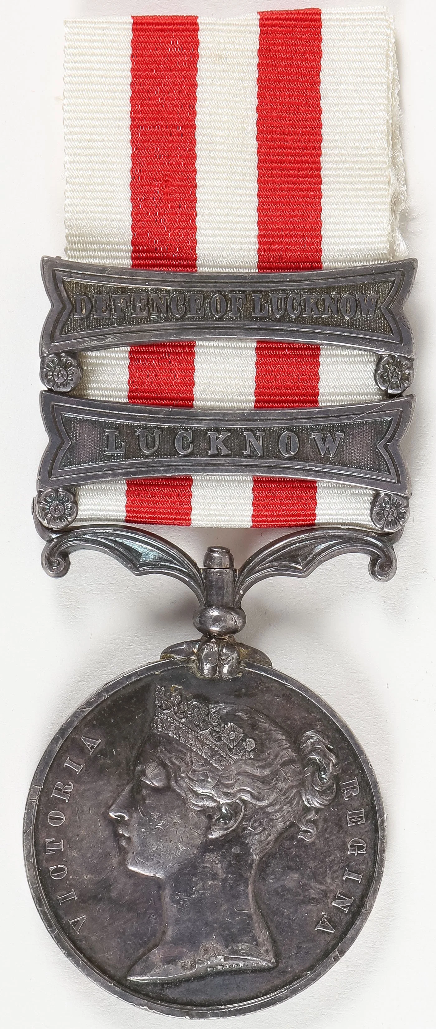 NAMED INDIAN MUTINY MEDAL WITH LUCKNOW CLASPS