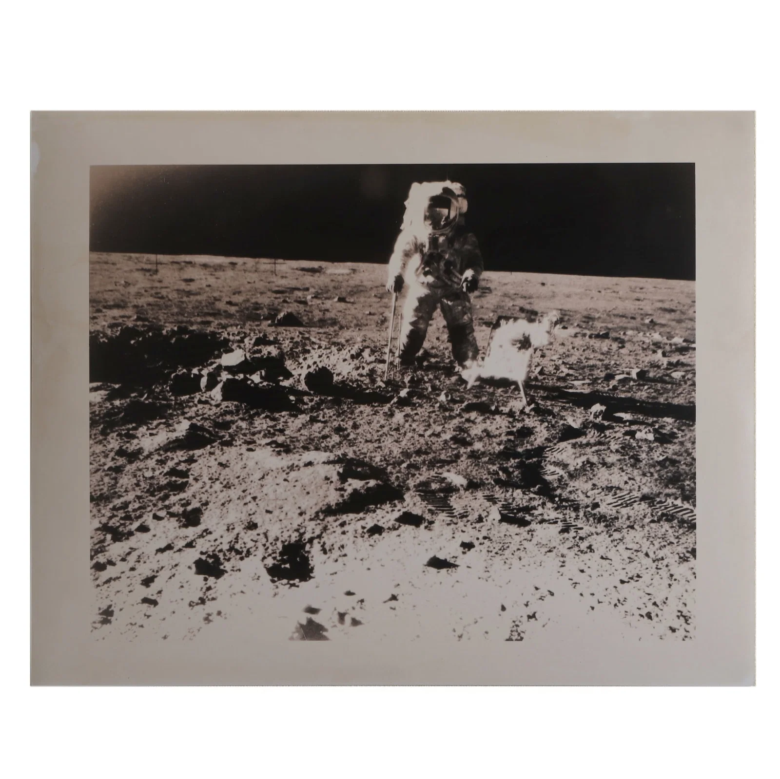 NASA, ASTRONAUT CHARLES "PETE" CONRAD COLLECTING LUNAR SAMPLES ON THE MOON, 1969