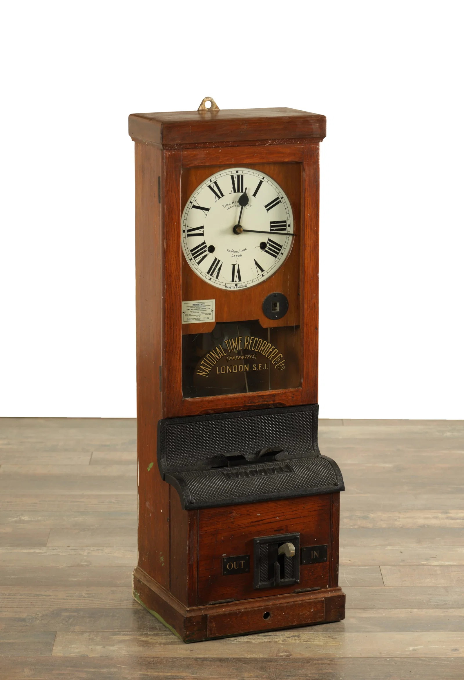 NATIONAL TIME RECORDER CO. LTD. A LATE 19TH CENTURY OAK CASED CLOCKING IN MACHINE