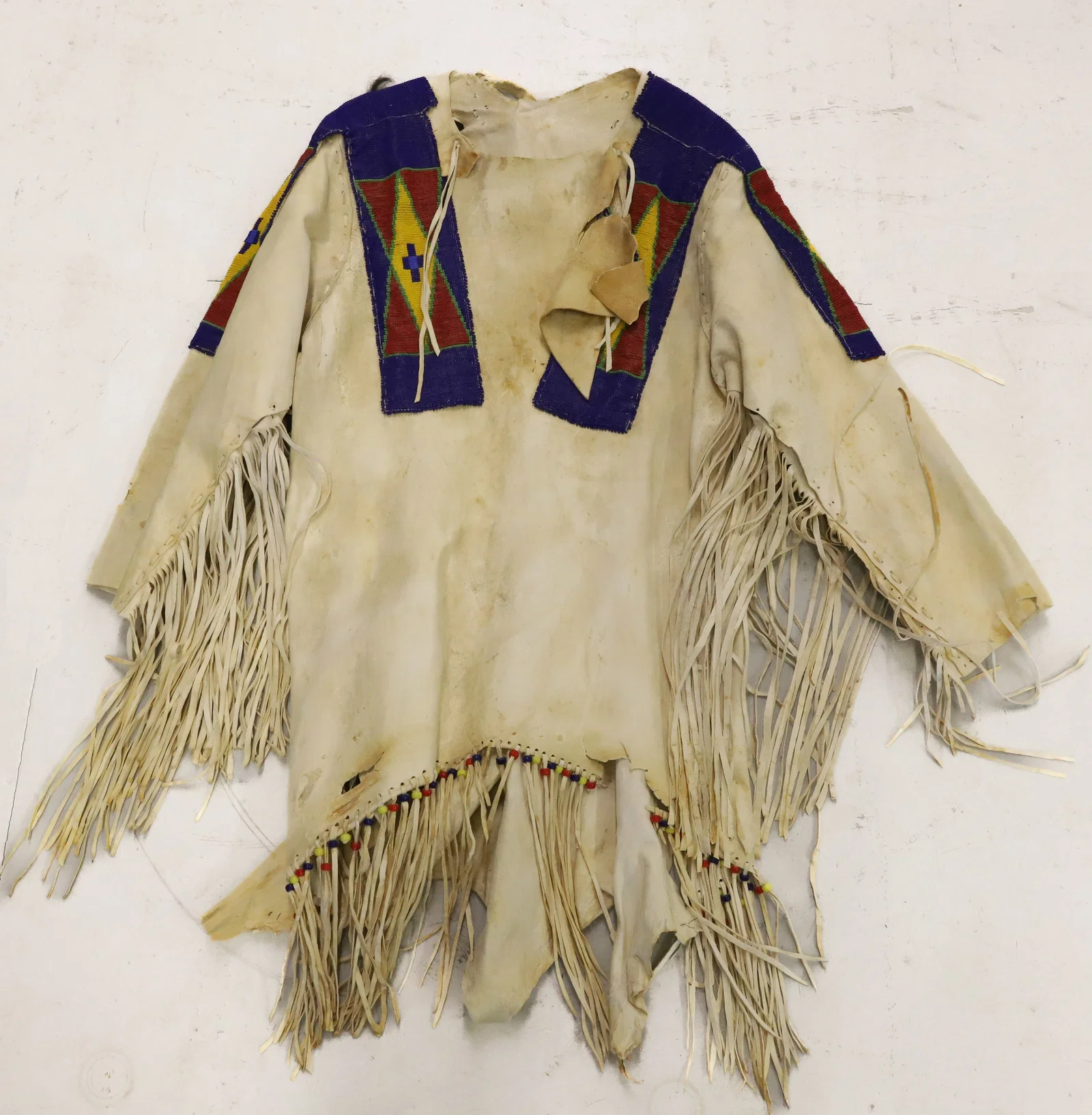 NATIVE AMERICAN BEADED BUCKSKIN WAR SHIRT