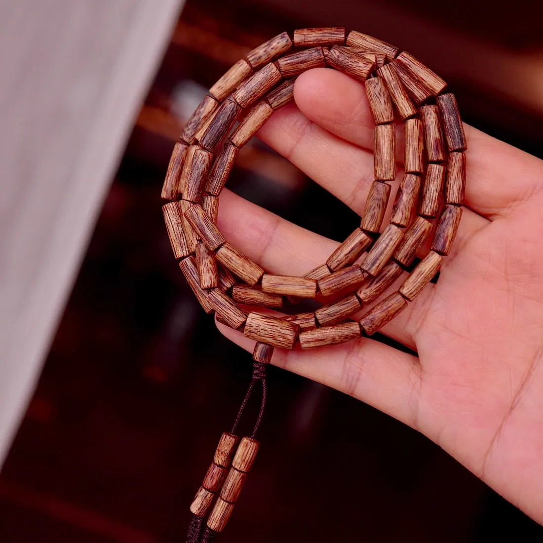 Natural agarwood bracelet with multiple loops design, can also be worn as a necklace.