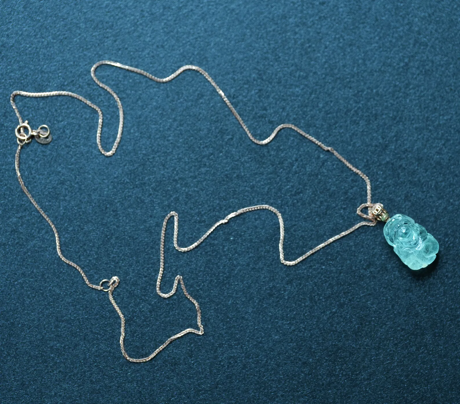 Natural fruit-green high-ice tourmaline necklace, set in 18k gold.