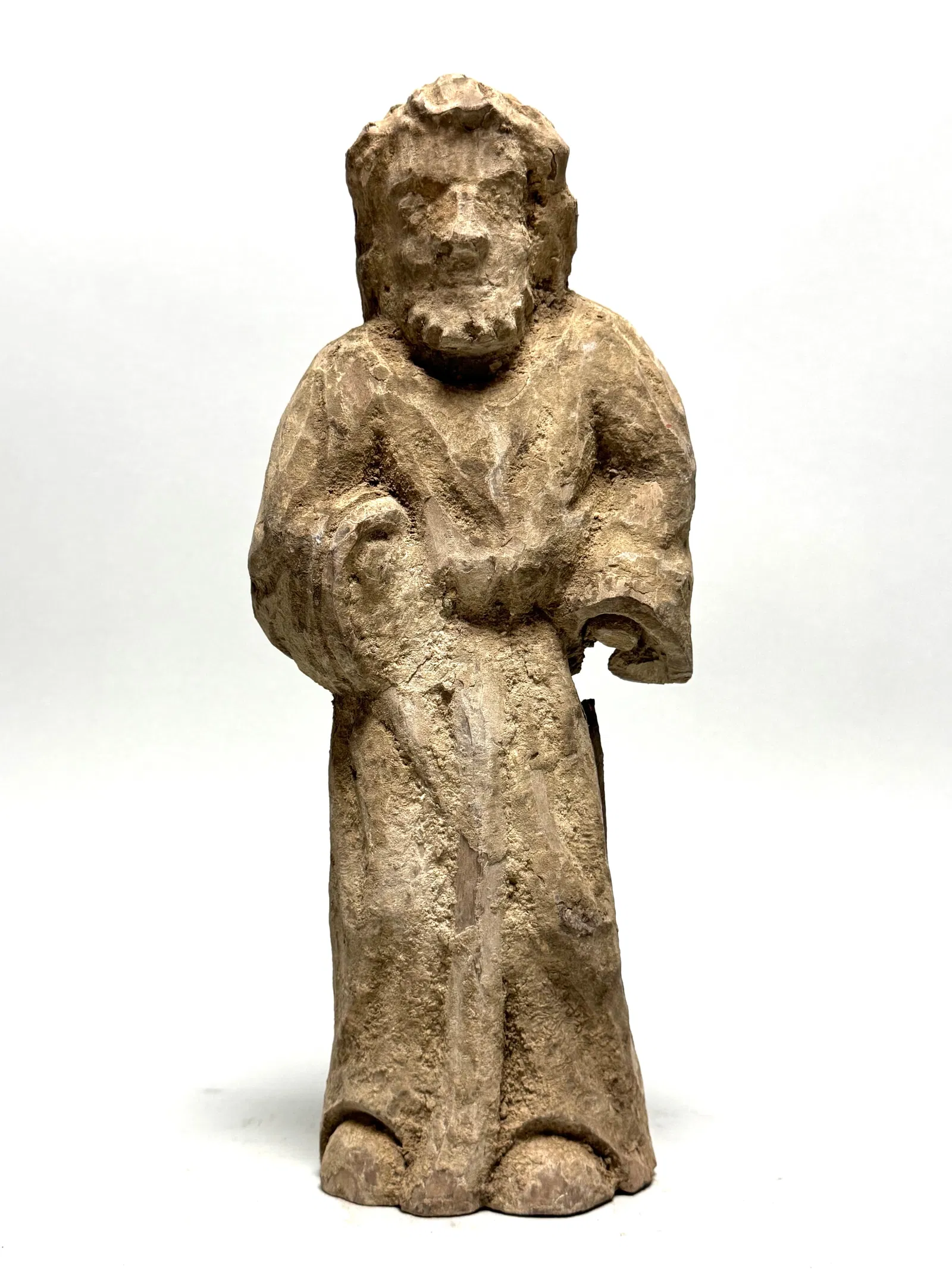 Old carved sculpture of a saint