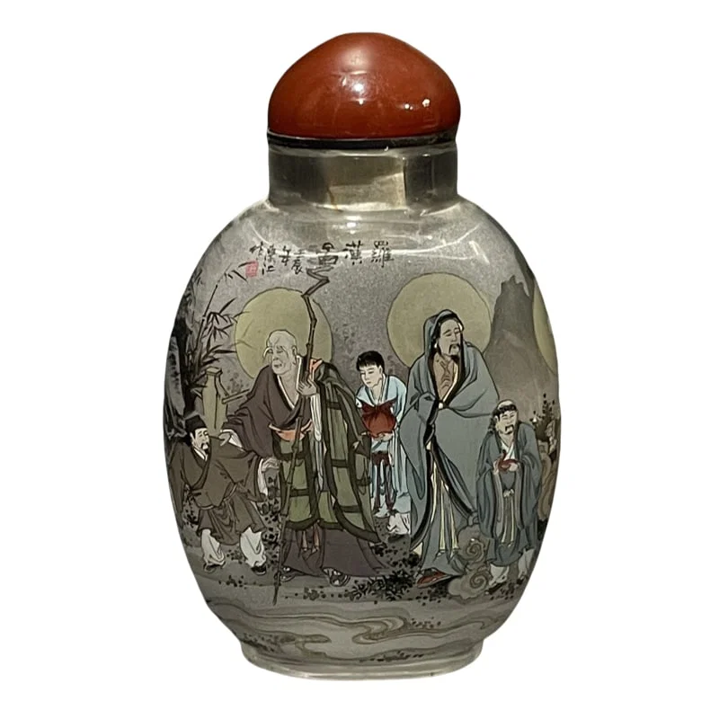 Old glass snuff bottle with inside painted Arhat design.