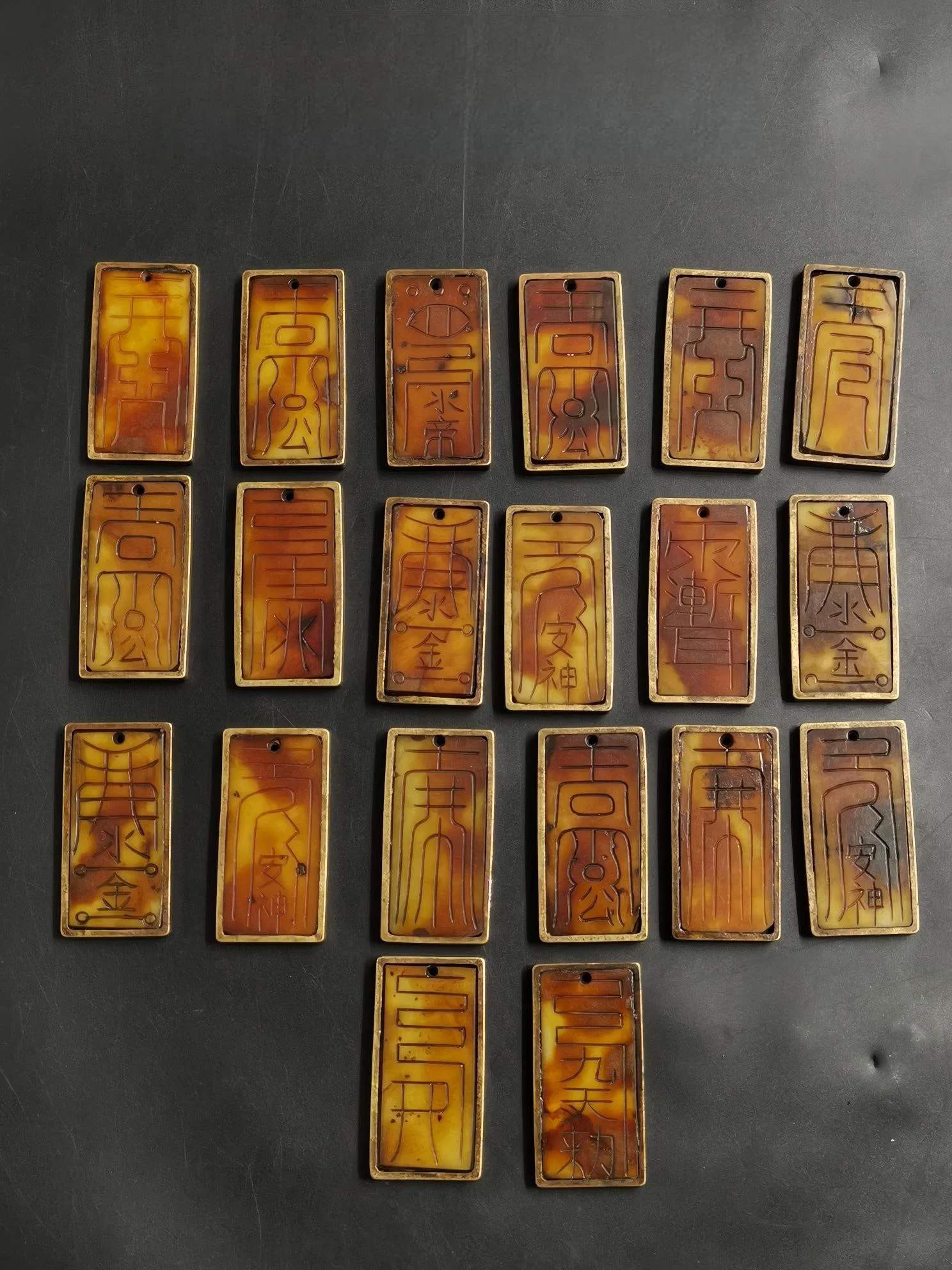 Old Hetian jade plaque with copper inscription featuring Taoist talismans
