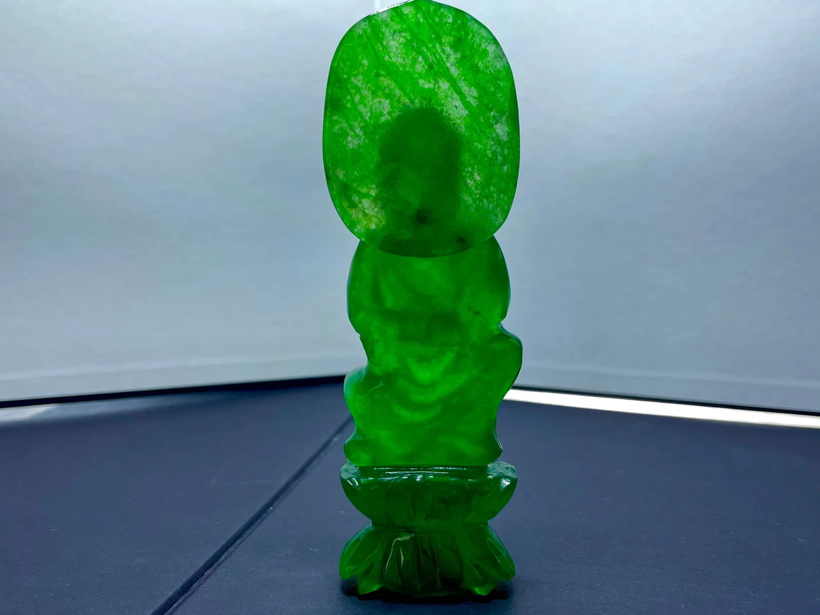 Old jadeite, high-ice imperial green Guanyin Buddha ornament