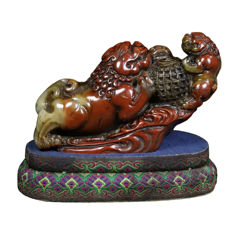 Old Tibetan Shoushan stone lion with embroidered ball seal ornament