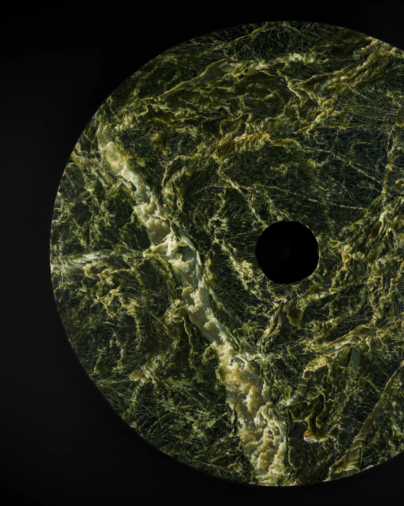 ONE OF THE LARGEST EVER FOUND JADE DISKS, BI, QIJIA CULTURE, 74 CM DIAMETER
