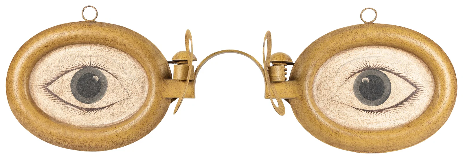 Optician's figural trade sign.