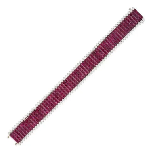 OSCAR HEYMAN: A PLATINUM, RUBY, AND DIAMOND BRACELET
