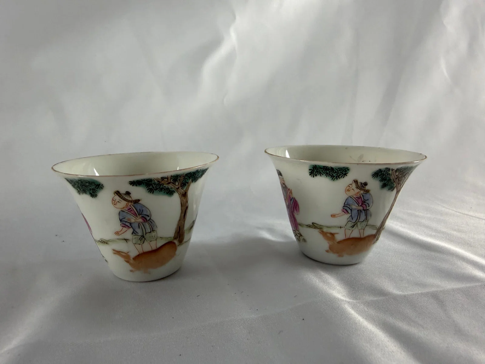 pair of Chinese famille rose figures porcelain cups