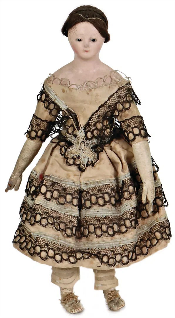 papier mâché shoulder headed doll, c. 1850, 23 cm, inset. glass eyes, closed mouth,