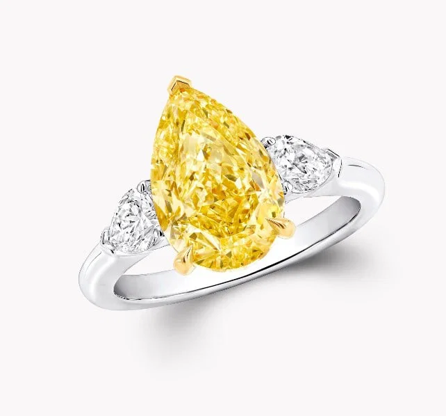 Pear-shaped vivid yellow diamond ring