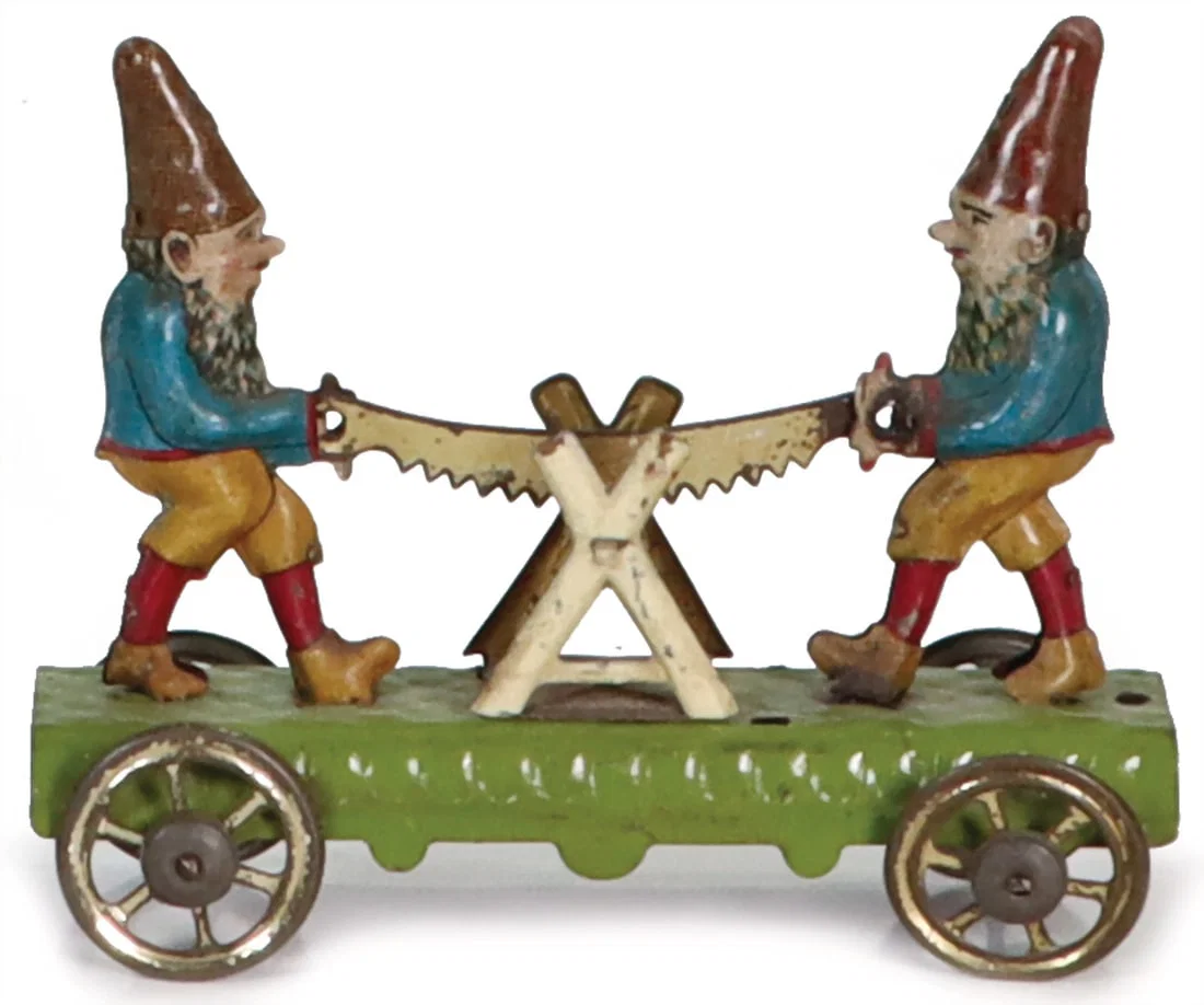PENNY TOY lithographed sheet metal, 2 dwarfs at the saw, h: 7 cm, slightly worn, good condition.