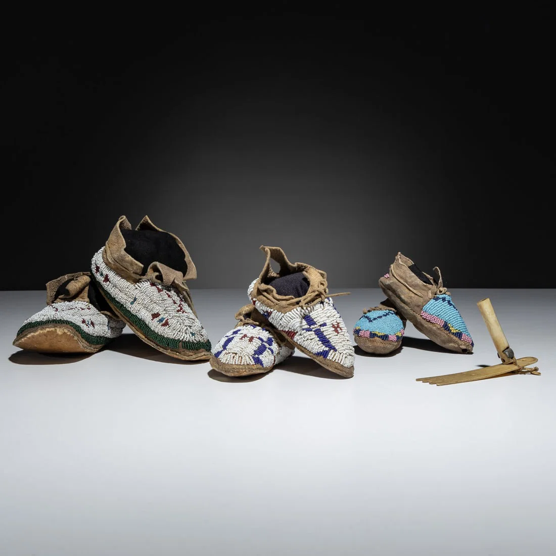 Plains Child's Beaded Hide Moccasins, and Roach Spreader