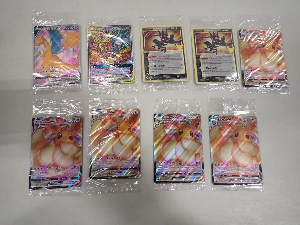 Pokemon Cards including Charizard, Tag Team, Greninja