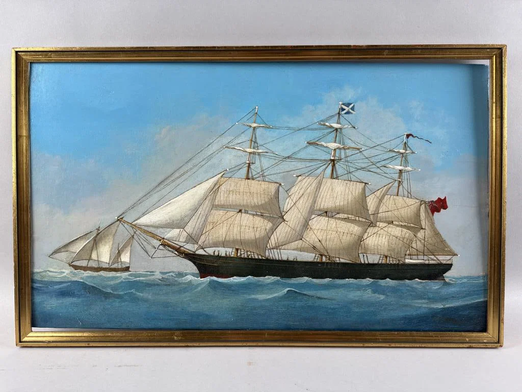 PORTRAIT OF AN ENGLISH SHIP AT SEA 19th Century Oil on board, 14.75" x 25.5". Framed 16" x 26.5".