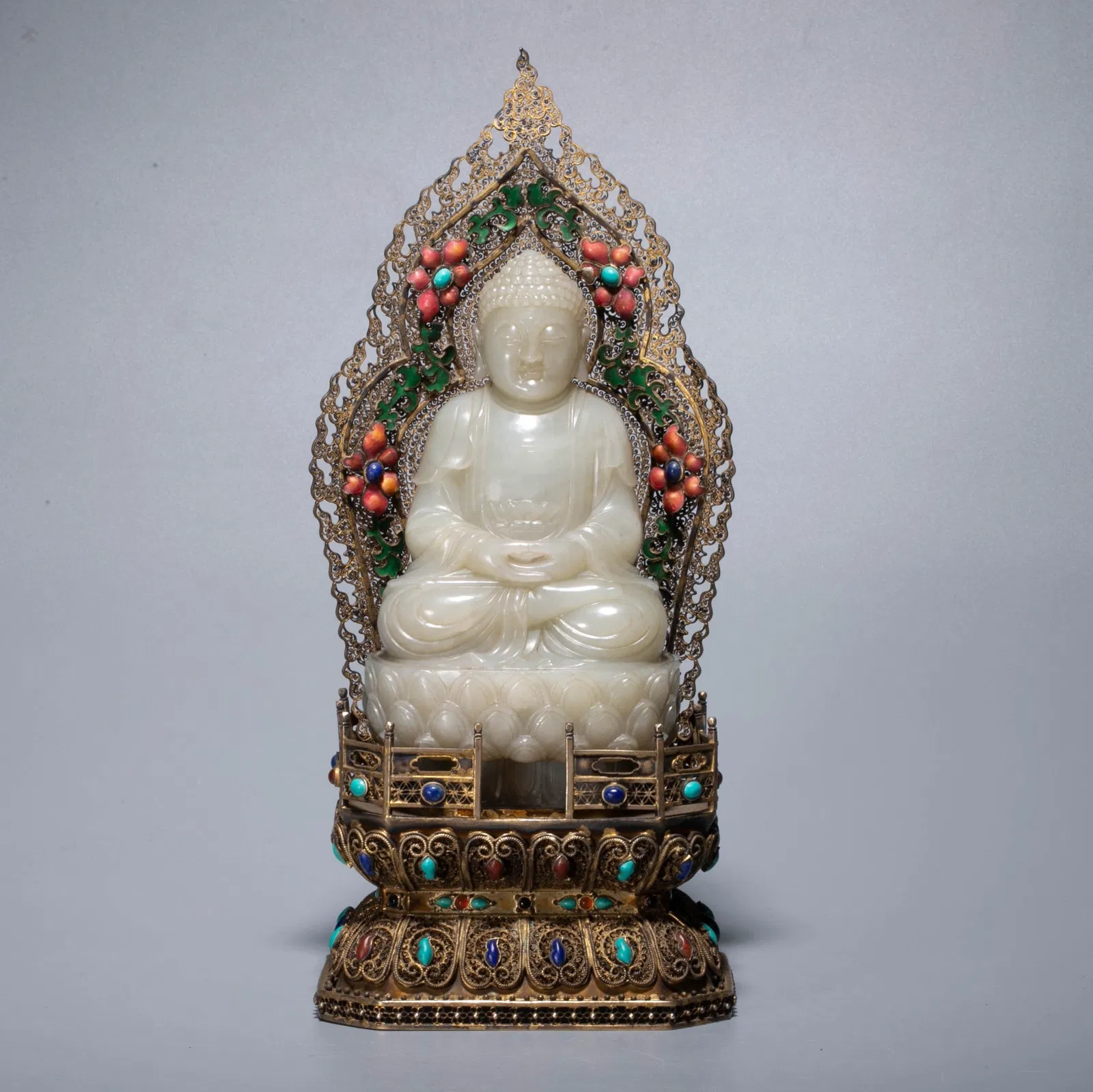 Qianlong Emperor of the Qing Dynasty. Imperial Hotan white jade sculpture of the Tathagata seated.