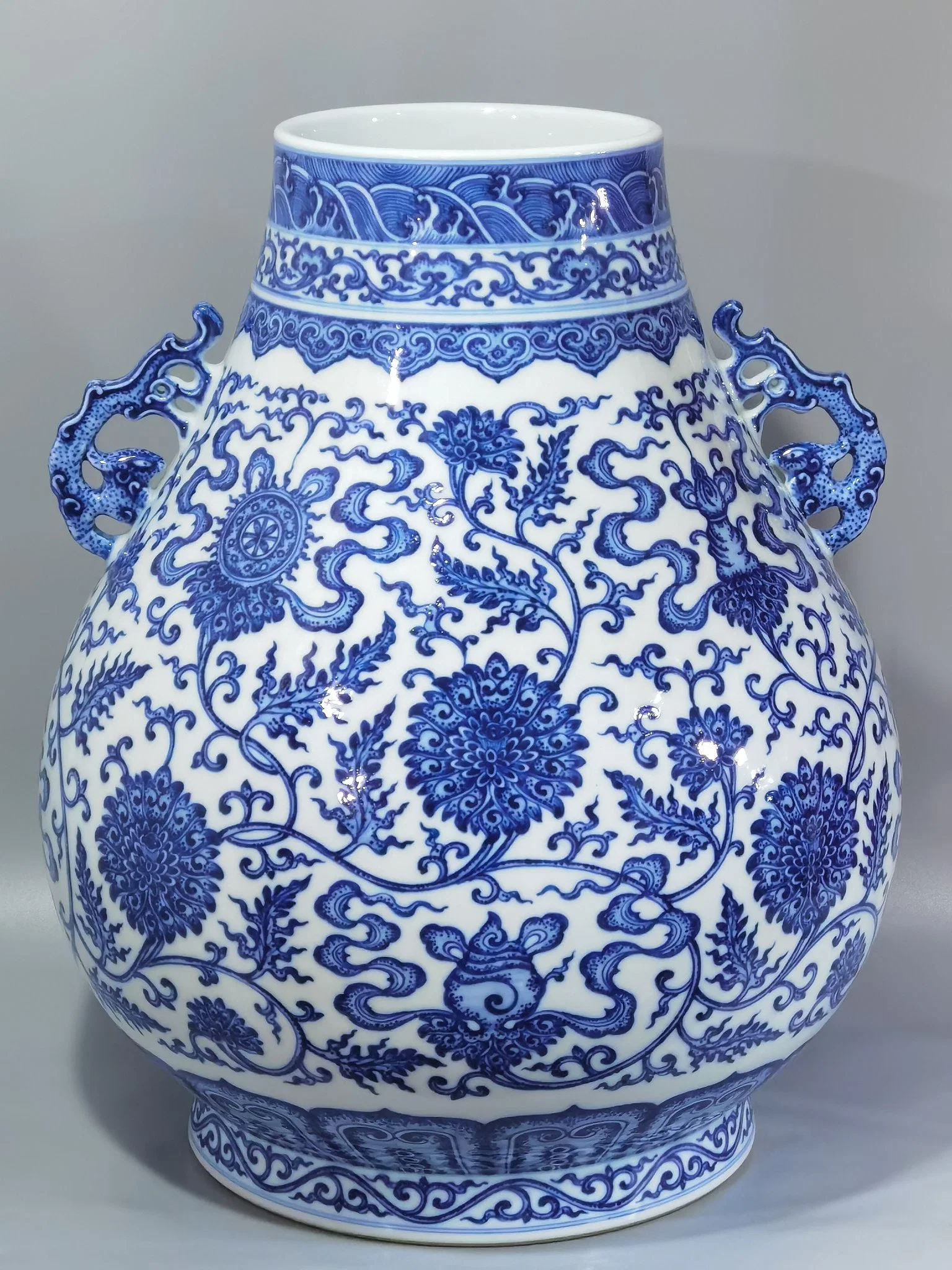 Qianlong period Qing Dynasty blue and white eight treasures lotus and lucky ears vase