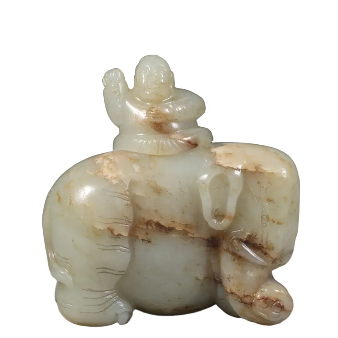 Qing Dynasty Hetian jade seed material boy riding elephant water vessel.