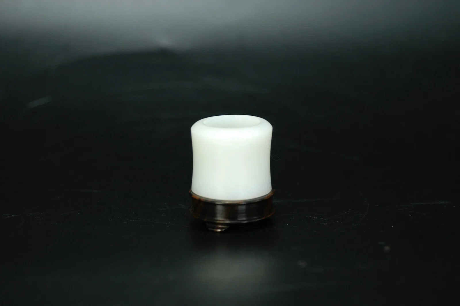 Qing Dynasty Hetian White Jade Archer's Ring with Wooden Stand
