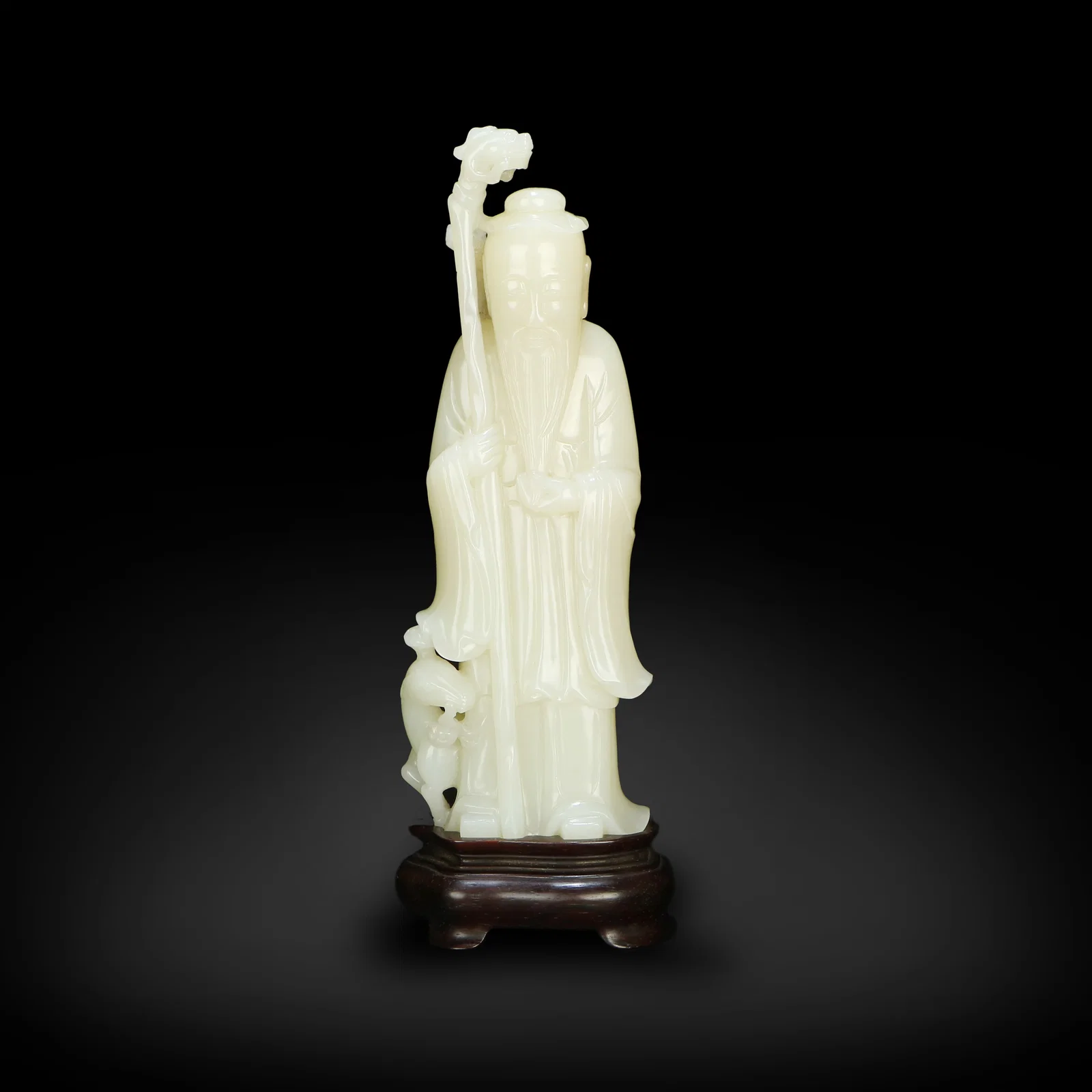 Qing Dynasty Hetian white jade ornament of a scholar