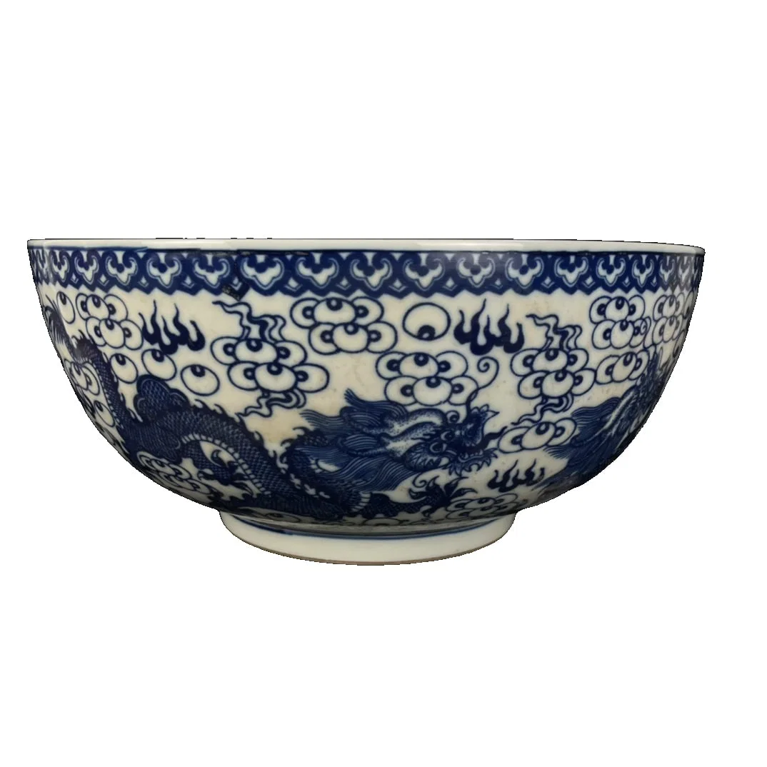Qing Dynasty Kangxi period blue and white bowl with dragon motif