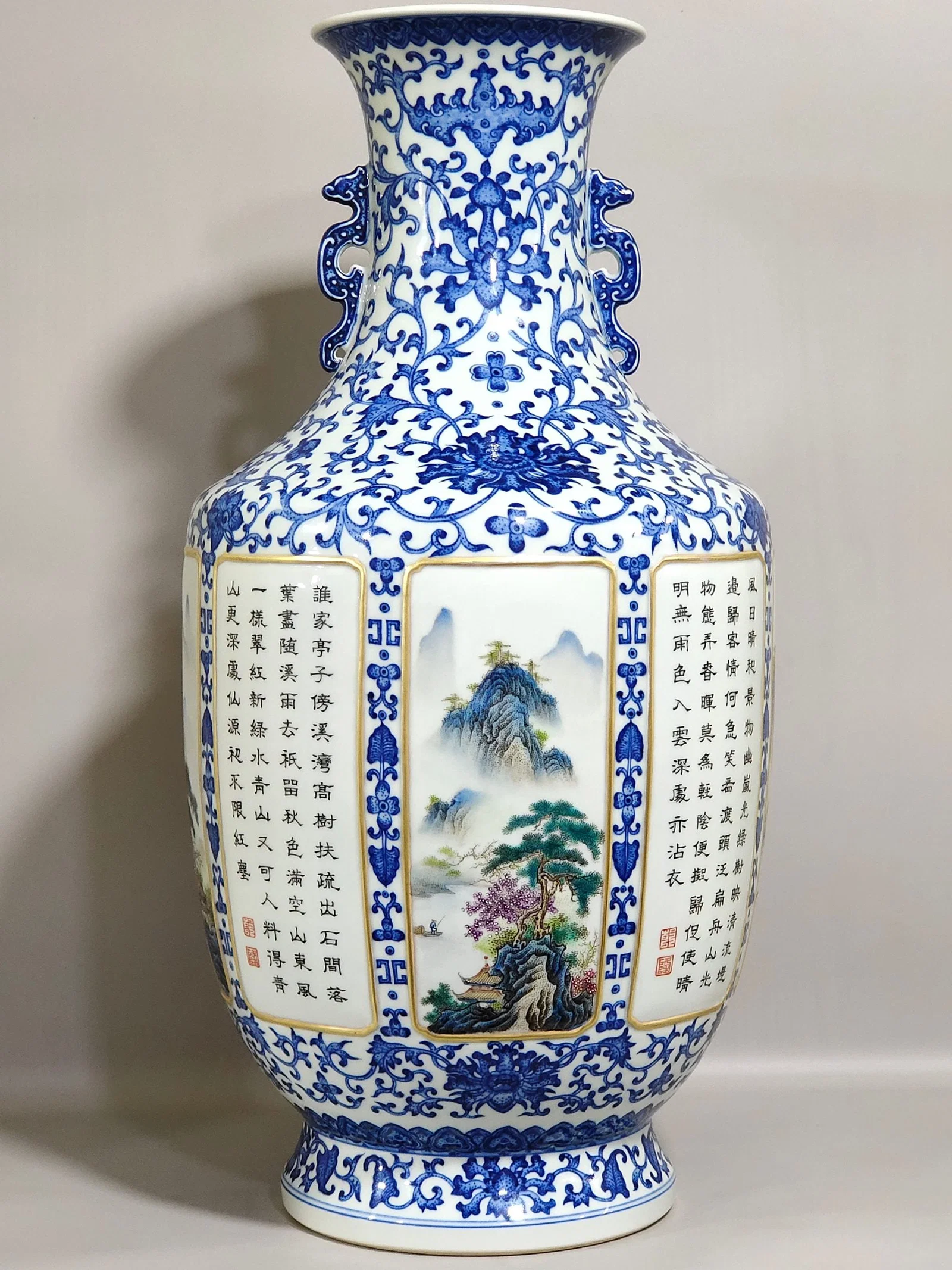 Qing Dynasty Qianlong blue and white and pastel windowed landscape poem amphorae