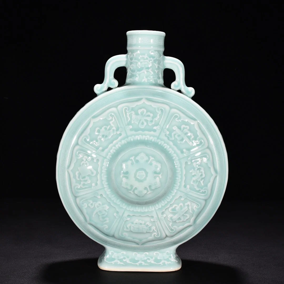 Qing Dynasty Qianlong pink celadon glaze eight treasures flat bottle