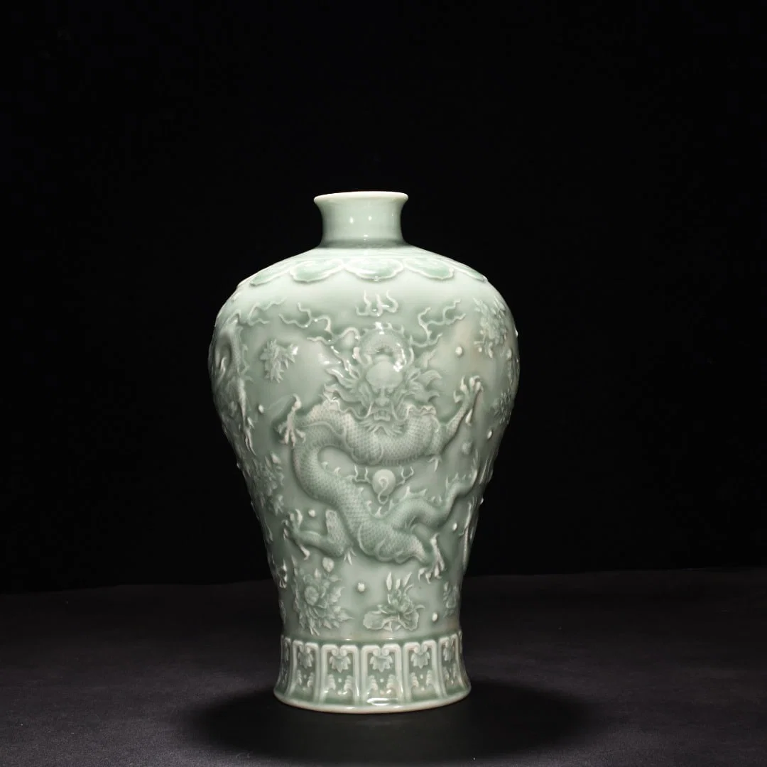 Qing Dynasty Qianlong pink celadon glaze five-dragon plum vase