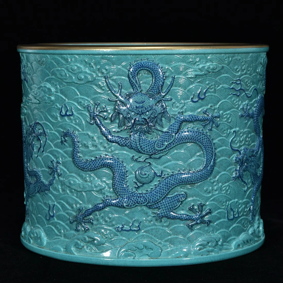 Qing Dynasty Qianlong turquoise glaze embossed seawater dragon pen holder
