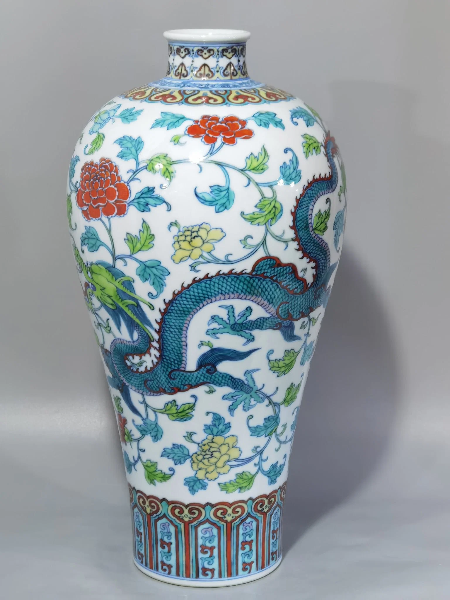 Qing Dynasty Yongzheng blue and white doucai dragon phoenix peony and flower plum vase