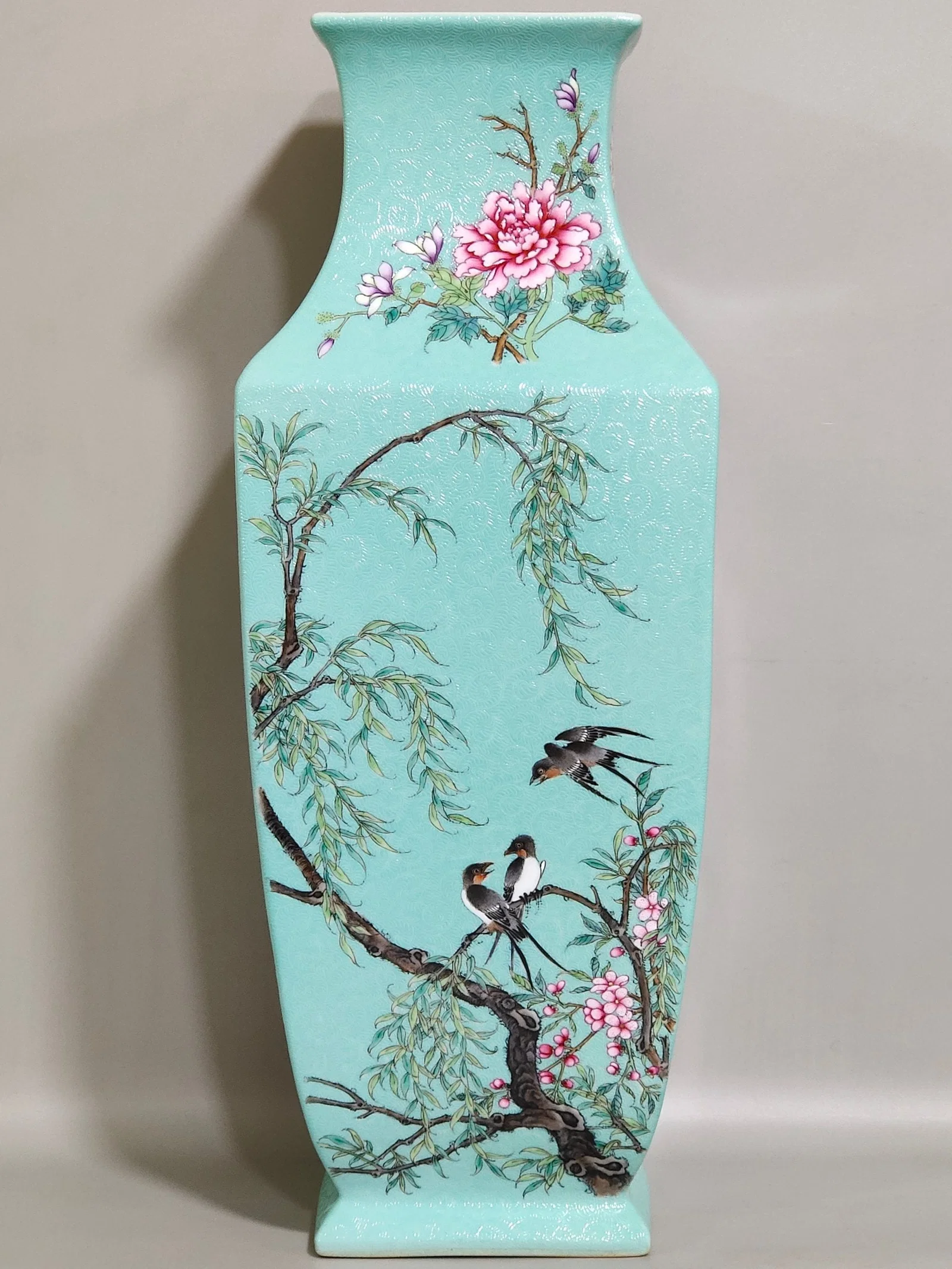 Qing Dynasty Yongzheng carved turquoise green four-season flower and bird square vase