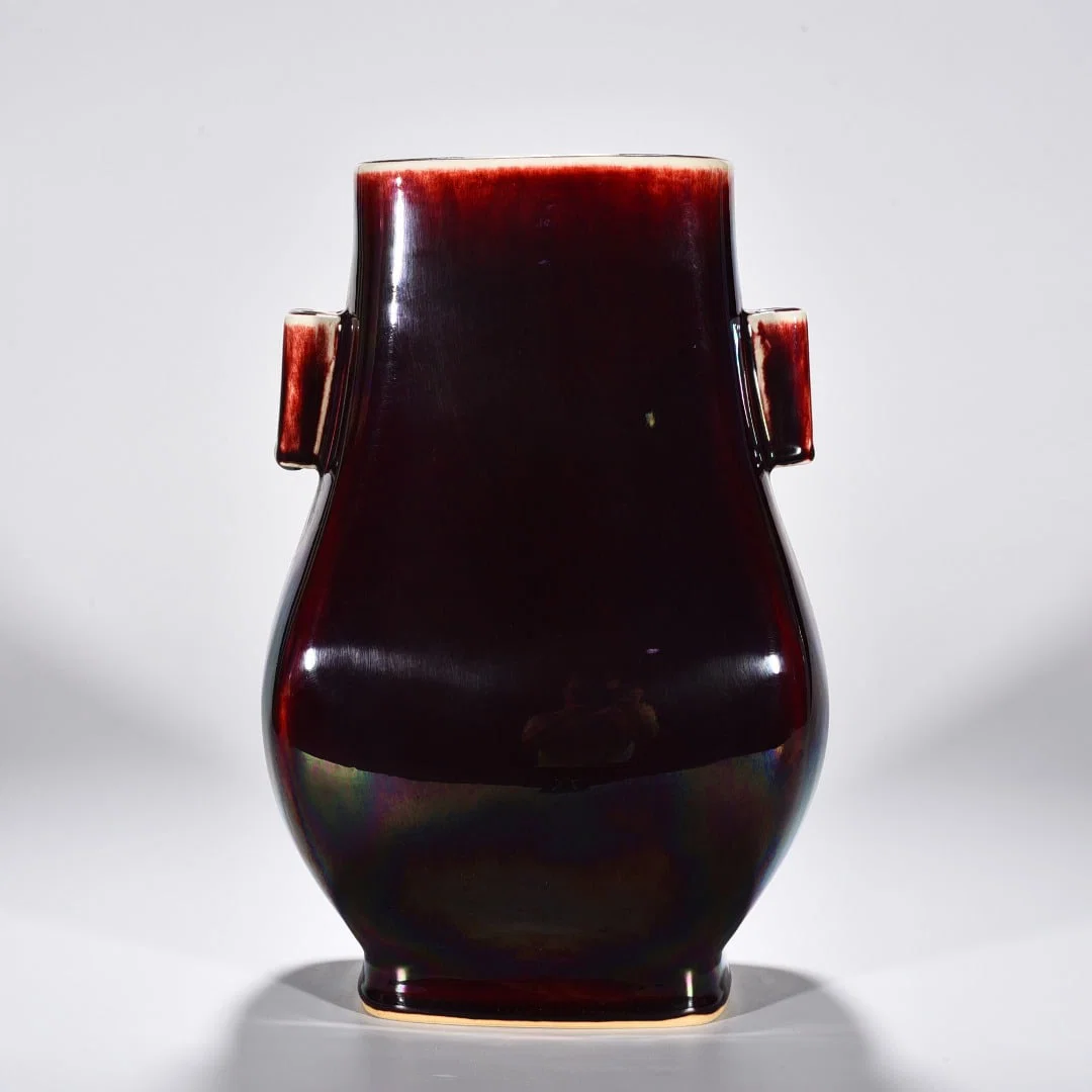 Qing Dynasty Yongzheng Lang Kiln red glaze through-ear vase
