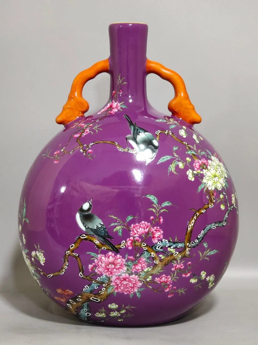 Qing Dynasty Yongzheng purple-glazed eggplant skin flower and bird holding moon vase