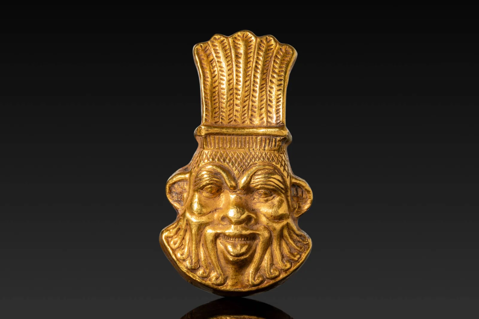 RARE EGYPTIAN HIGH KARAT GOLD HEAD OF BES PENDANT