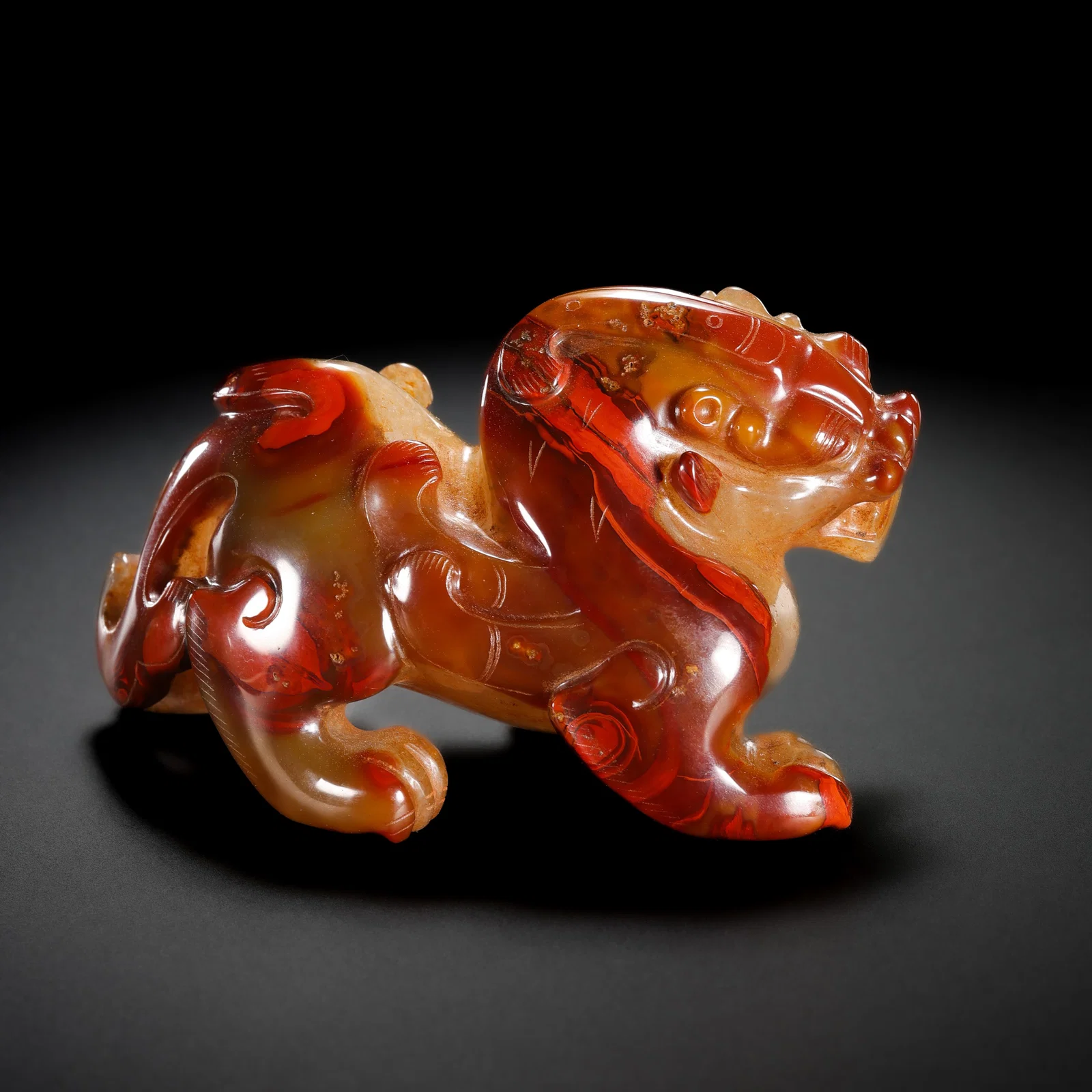 Red agate auspicious beast from the Warring States period in China