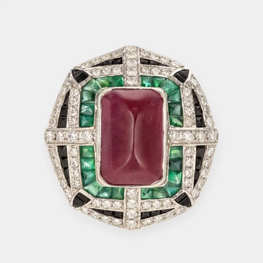 Ring with diamonds of approx. 4.50 ct, treated natural ruby ??of approx. 10 ct and emeralds of