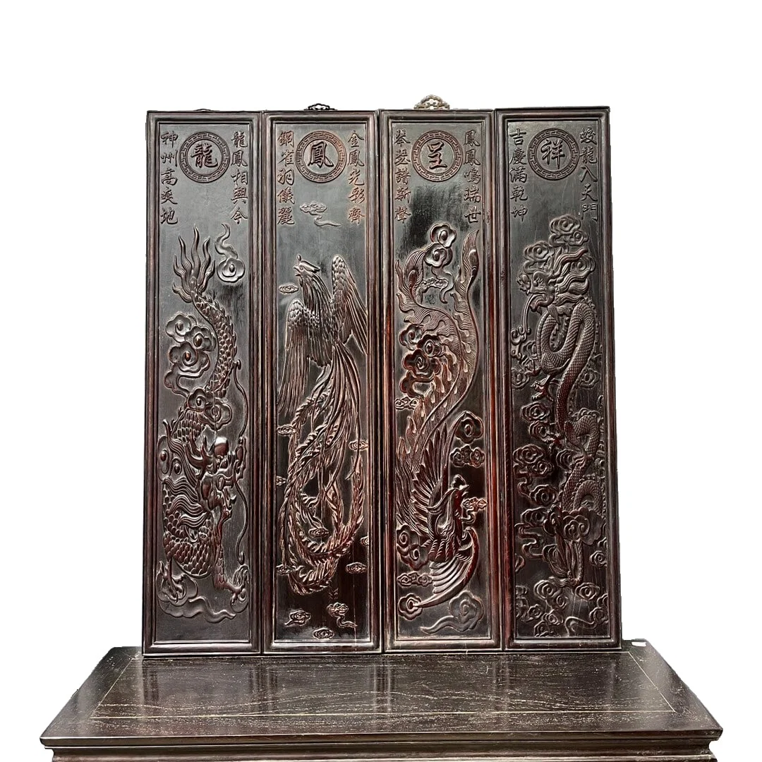 Sandalwood carved screen with four panels depicting dragons and phoenixes.