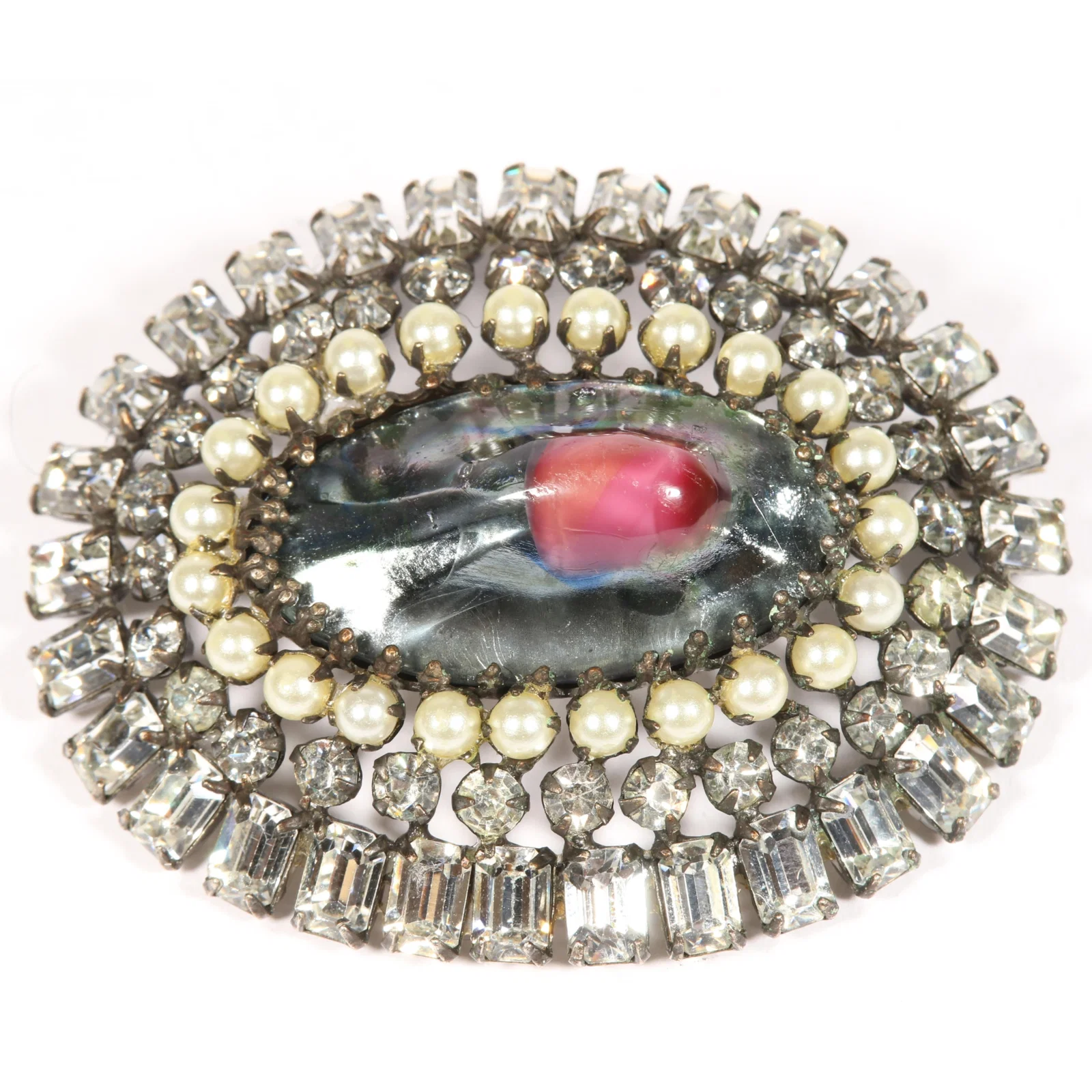 Schreiner blister brooch with grey and pink art glass center cabochon surrounded by faux pearls and