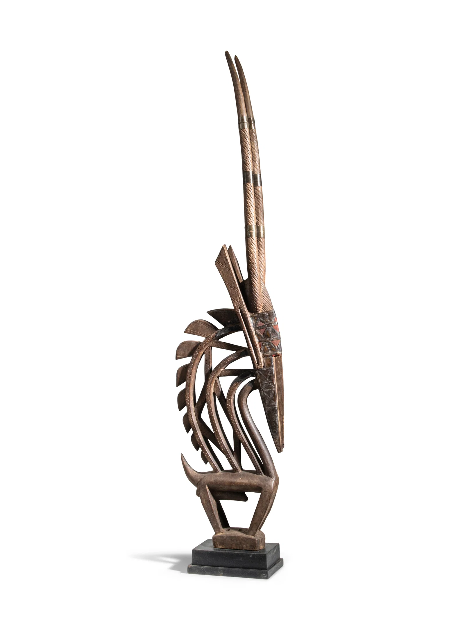 SCULPTURE A Bambara Tiwara antelope headdress. Wood. Mali. 116cm(h) Note The Bambara people of