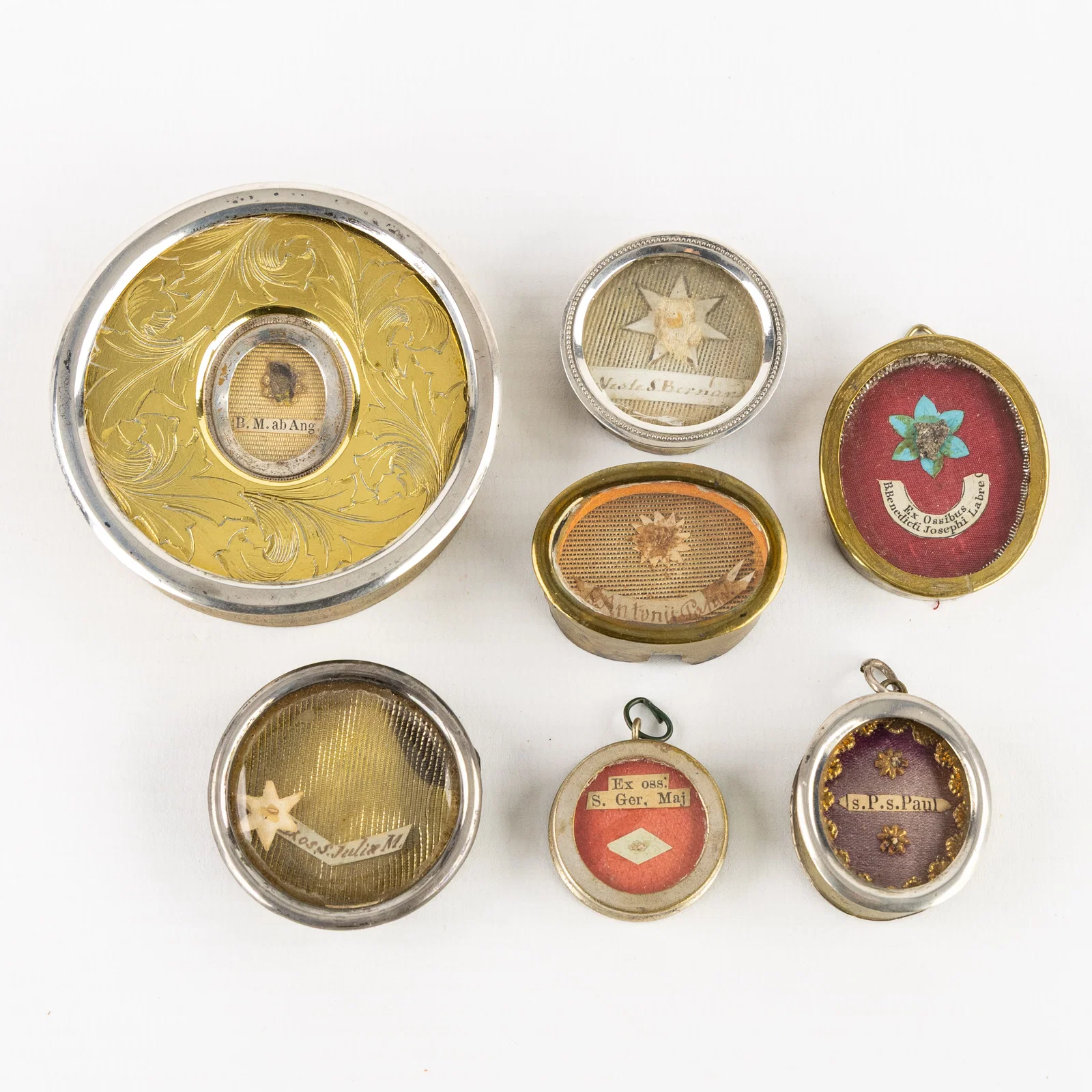 Seven Theca, five of which are sealed, with Relics for Saints and Blessed.