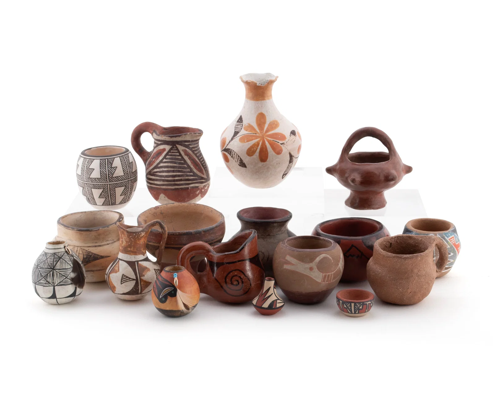 SEVENTEEN DIMINUTIVE NATIVE AMERICAN VESSELS