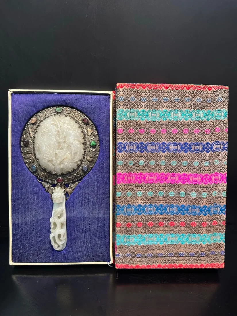 Silver inlaid jade ornaments from the Qing Dynasty