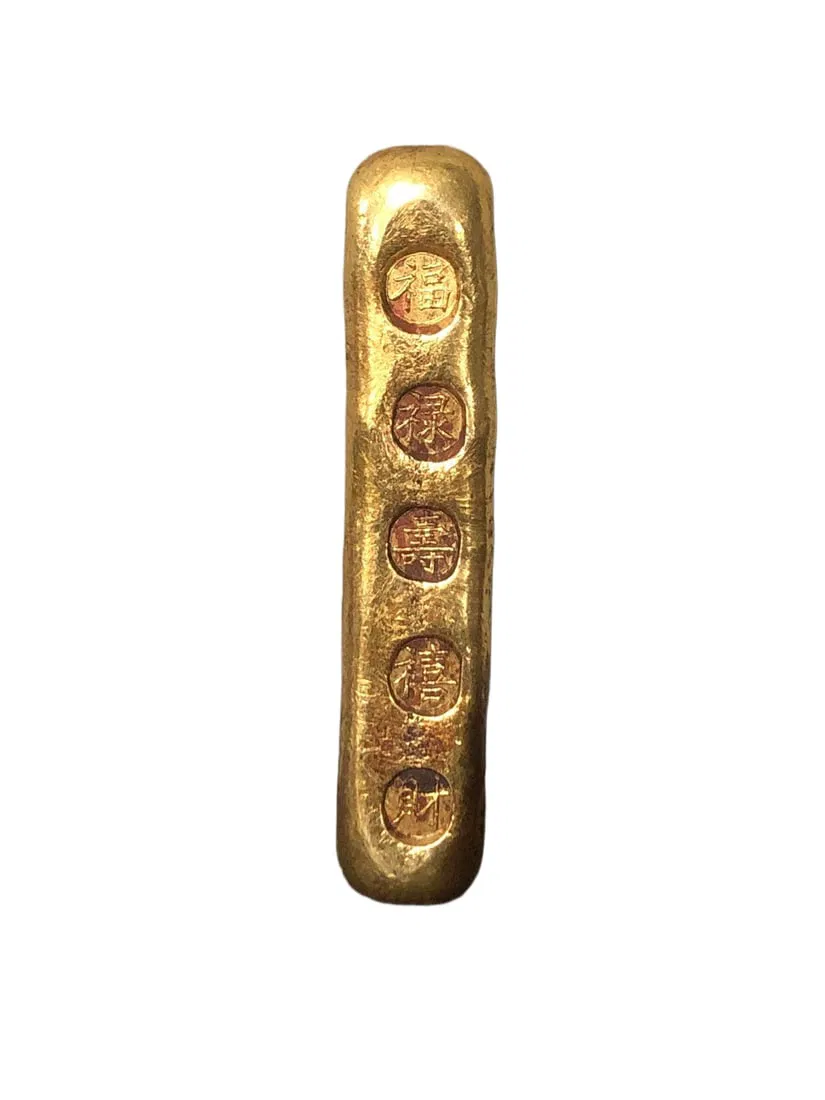 Solid gilded gold bars symbolizing fortune, prosperity, longevity, happiness, and wealth