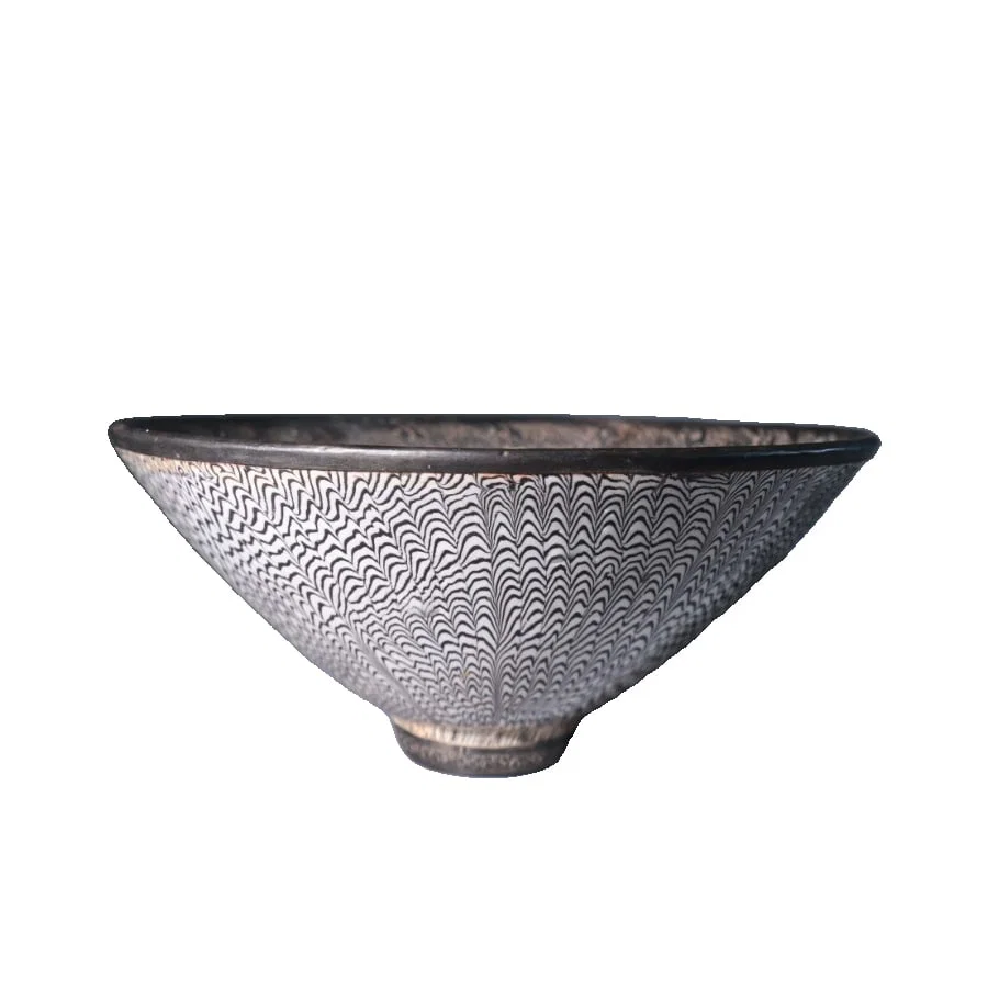 Song Dynasty bowl with silver rim, engraved with floral patterns and a hat-shaped lid.