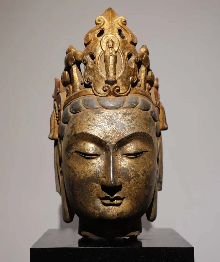 TANG DYNASTY BLUESTONE WITH GILDED AND PAINTED GUANYIN HEAD