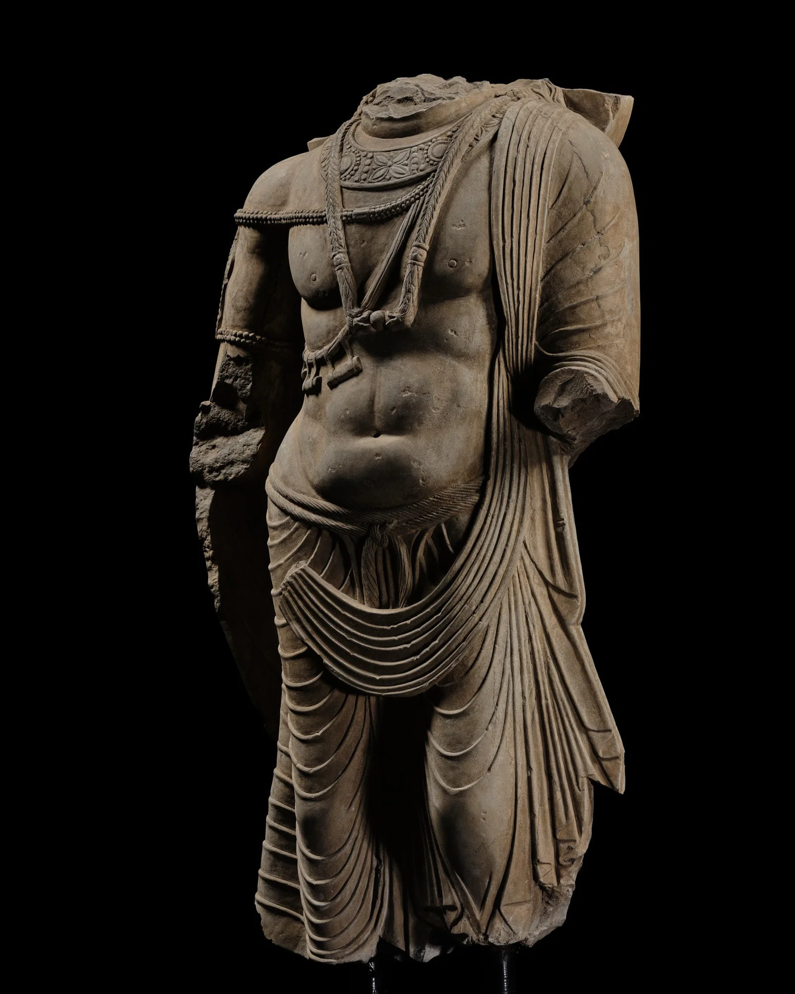 THE MONUMENTAL 'KIENZLE' TORSO OF A BODHISATTVA, ANCIENT REGION OF GANDHARA, KUSHAN PERIOD, CIRCA